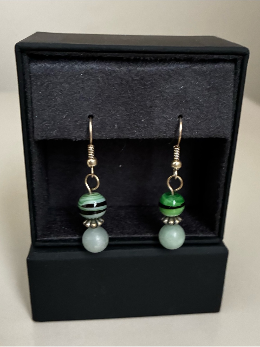 Handcrafted dangling earrings by Becca